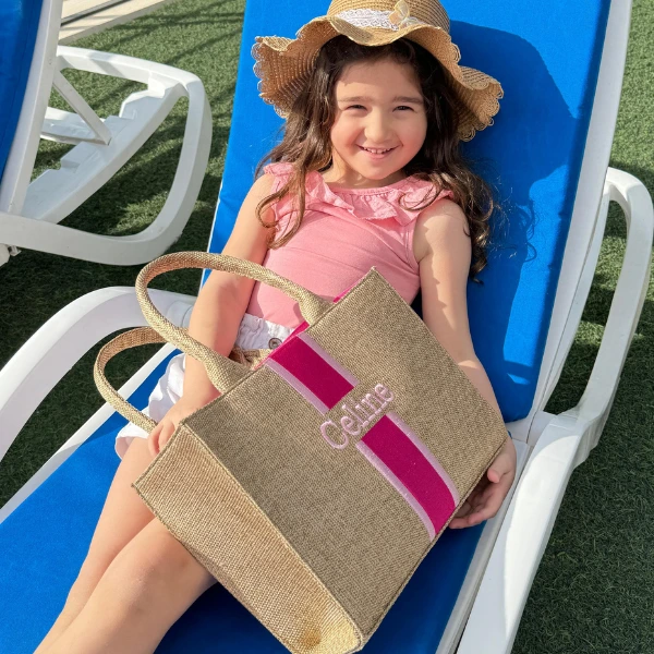 Kids beach bags – colorful, spacious, and lightweight bags perfect for carrying beach toys, towels, and essentials.