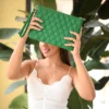 Green clutch from The Clutches collection – bold, fresh, and modern handbag